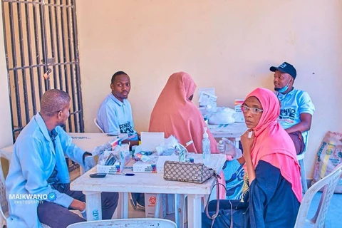 Medical outreach team attending to community members